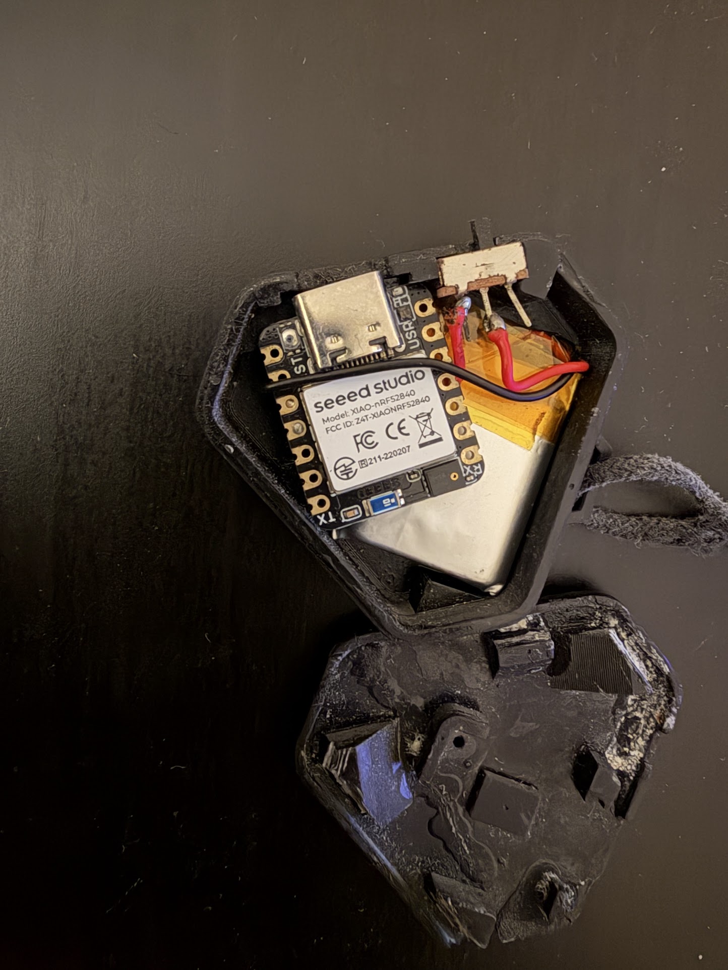 OMI pendant — Seeed XIAO nRF52840 and LiPo battery in a 3D-printed case